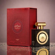 Lattafa Nebras EDP 100ml perfume bottle with red box packaging on a dark background
