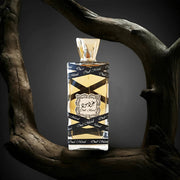 Lattafa Oud Mood EDP 100ml black ribbon wrapped bottle with gold cap
