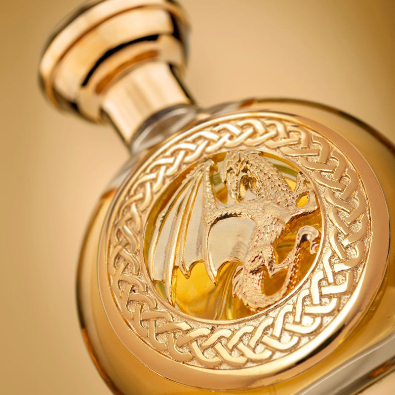 Gold round perfume bottle with dragon emblem (Dragon Emblem Eau de Parfum 100 ml)