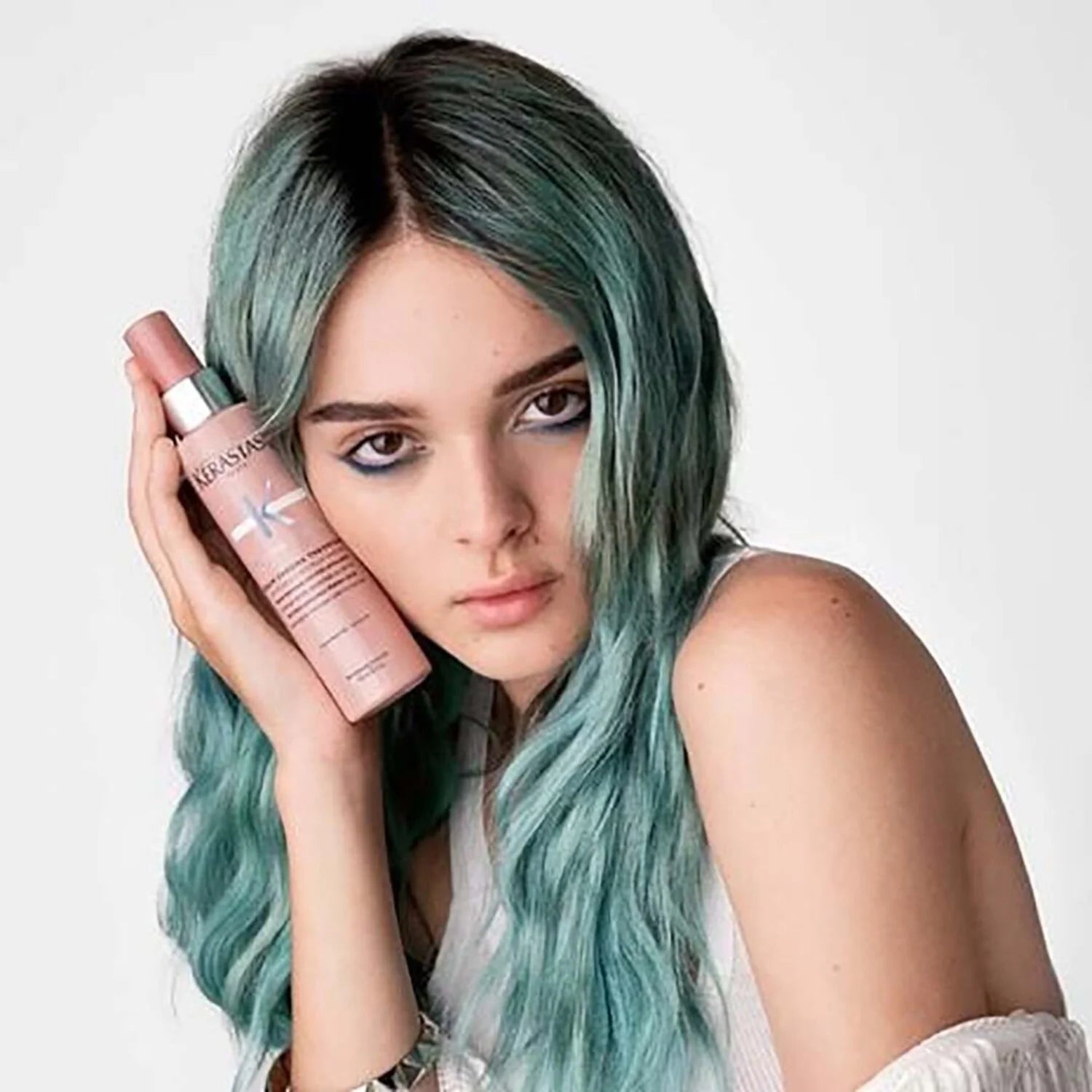 Rəngli və zədələnmiş saçlar üçün istilikdən qoruyan serum