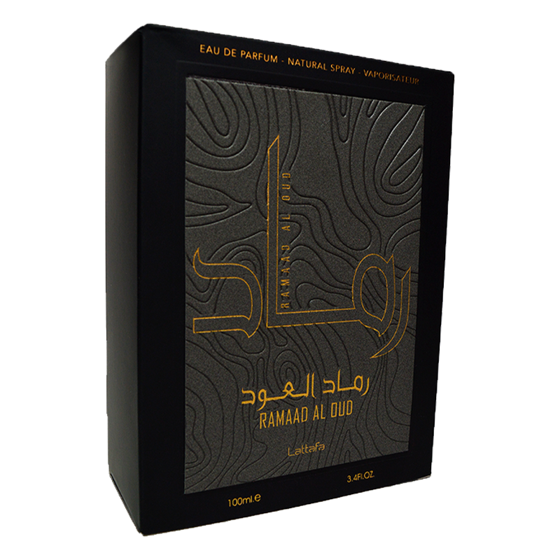Lattafa Ramaad Al Oud EDP 100ml black perfume bottle and box with gold details on white background
