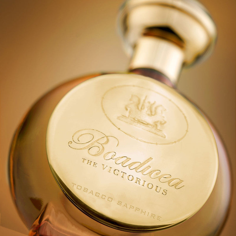 Boadicea the Victorious Tobacco Sapphire Eau de Parfum 100 ml bottle close-up (gold emblem, unisex niche fragrance)